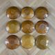 Set of 9 mustard earthenware plates.