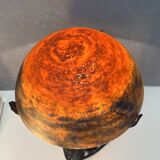 Contemporary mushroom lamp, wrought iron base and shaded orange glass shell