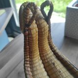 Original and vintage woven basket in the shape of an Asian dragon