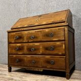 Louis XVI period chest of drawers in burr walnut with plum wood marquetry on all sides