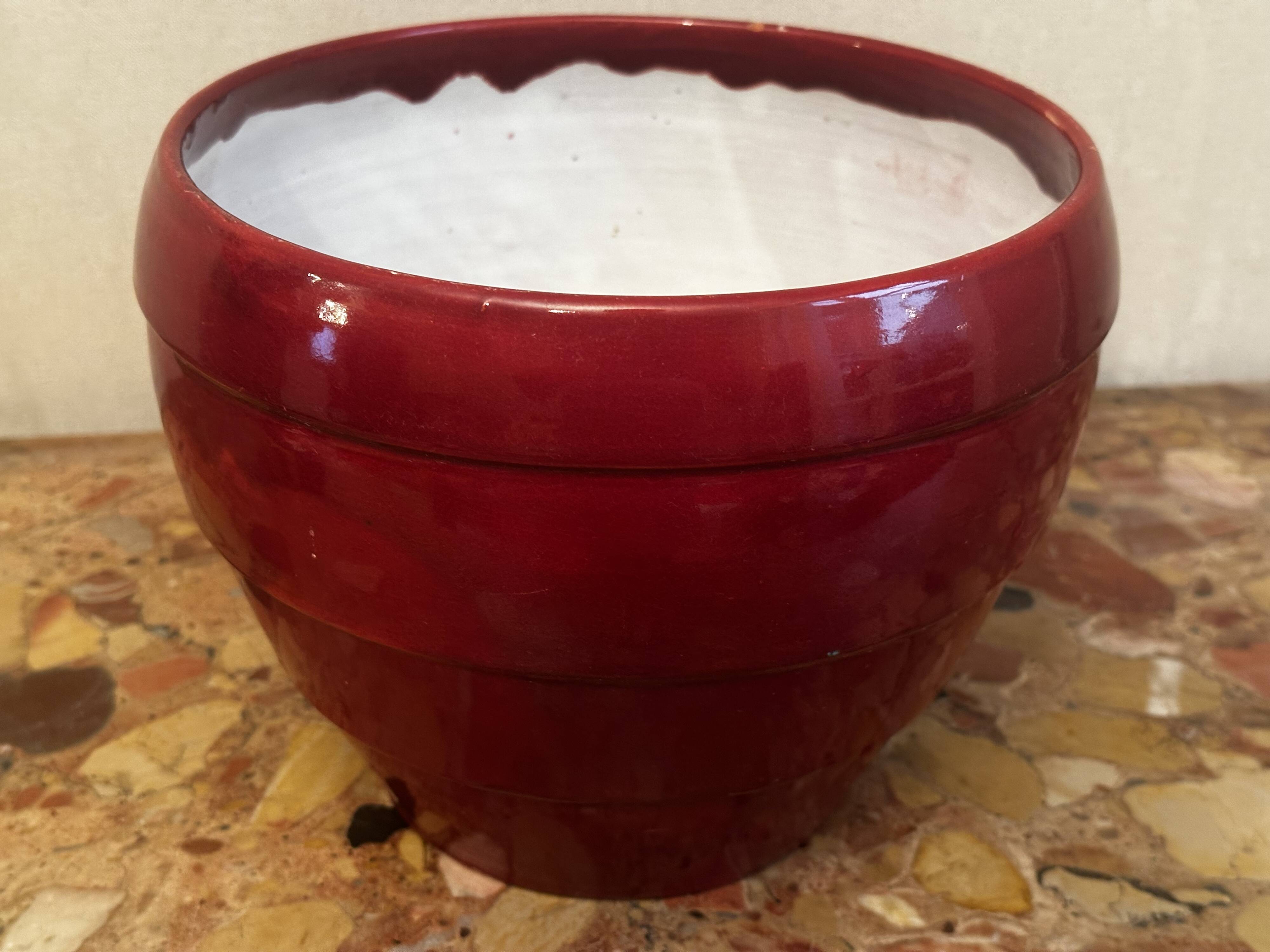 Burgundy glazed ceramic planter