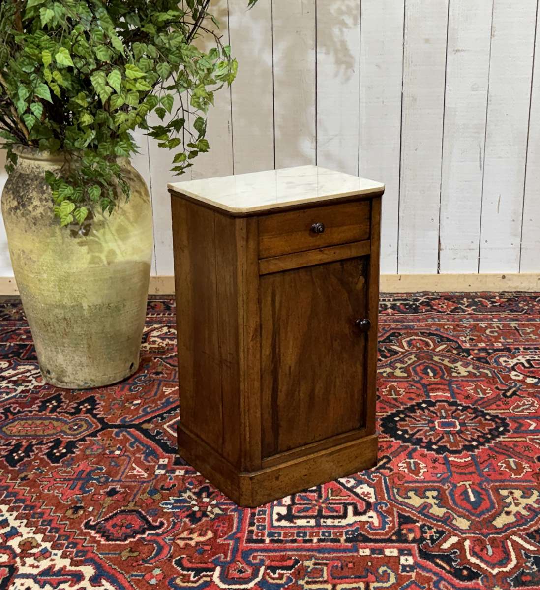 Nightstand in walnut with a white marble top, 19th century.