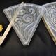 Pair of angular art deco wall sconces with silver metal frames