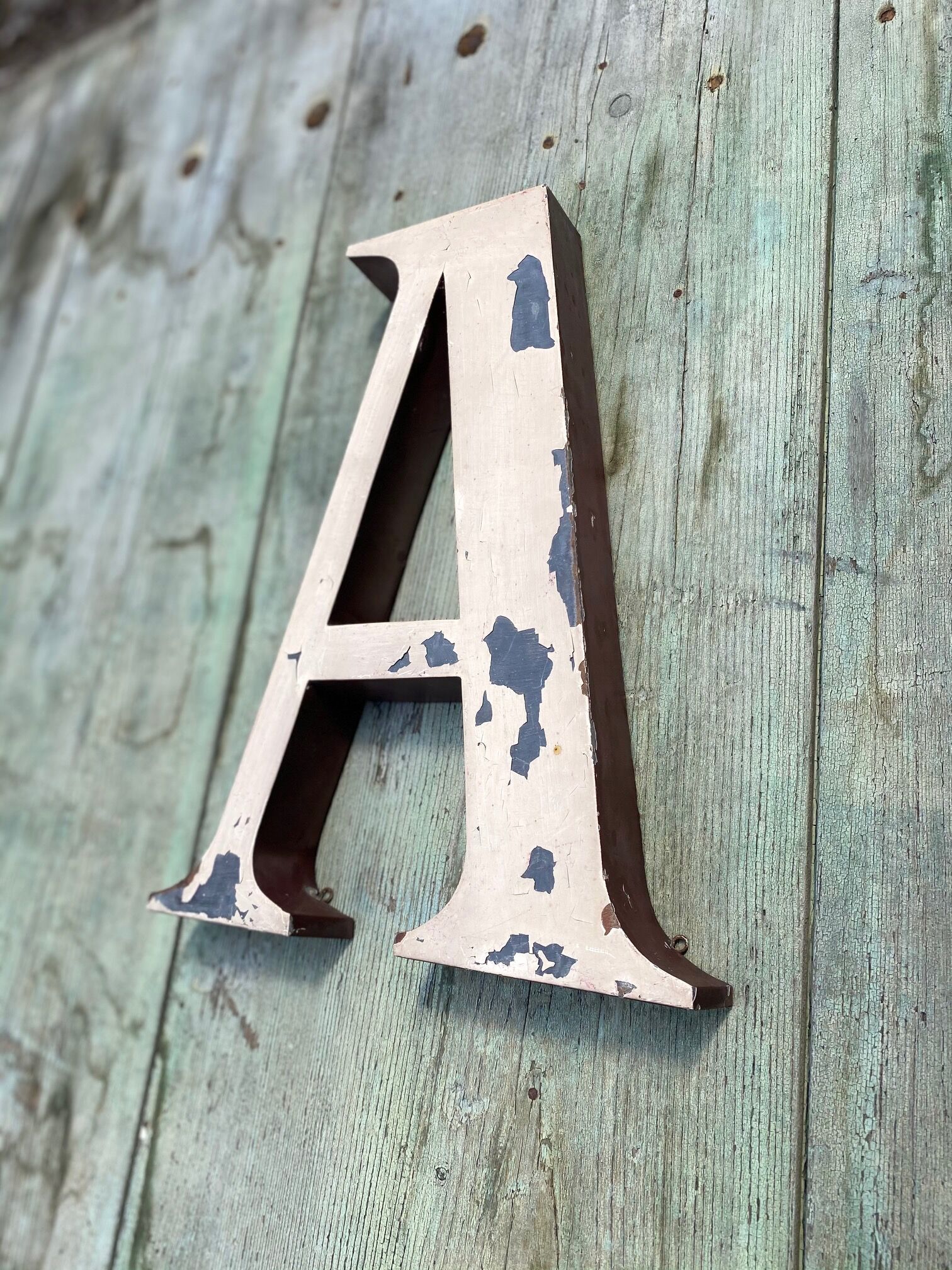 Sign letters forming the word "art"