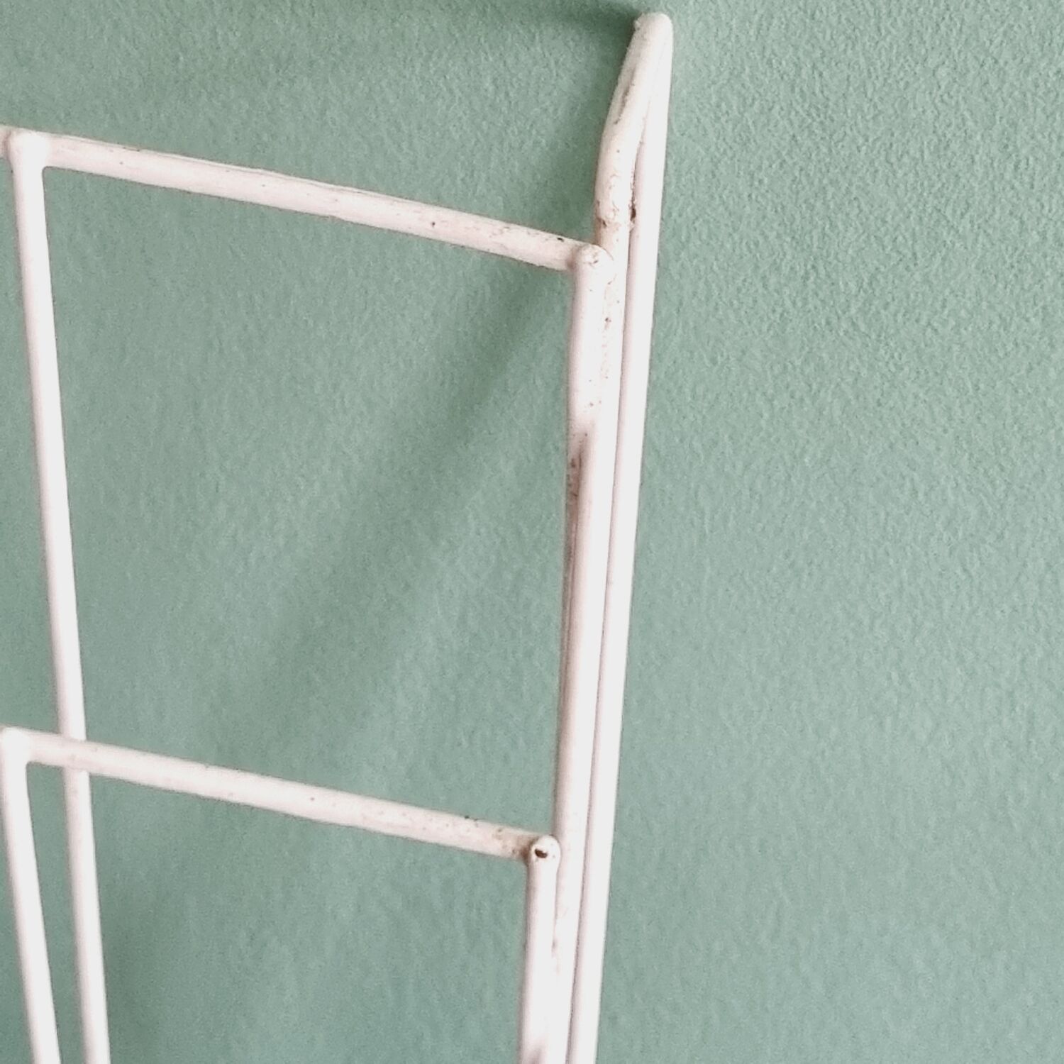 Vintage white wall magazine holder