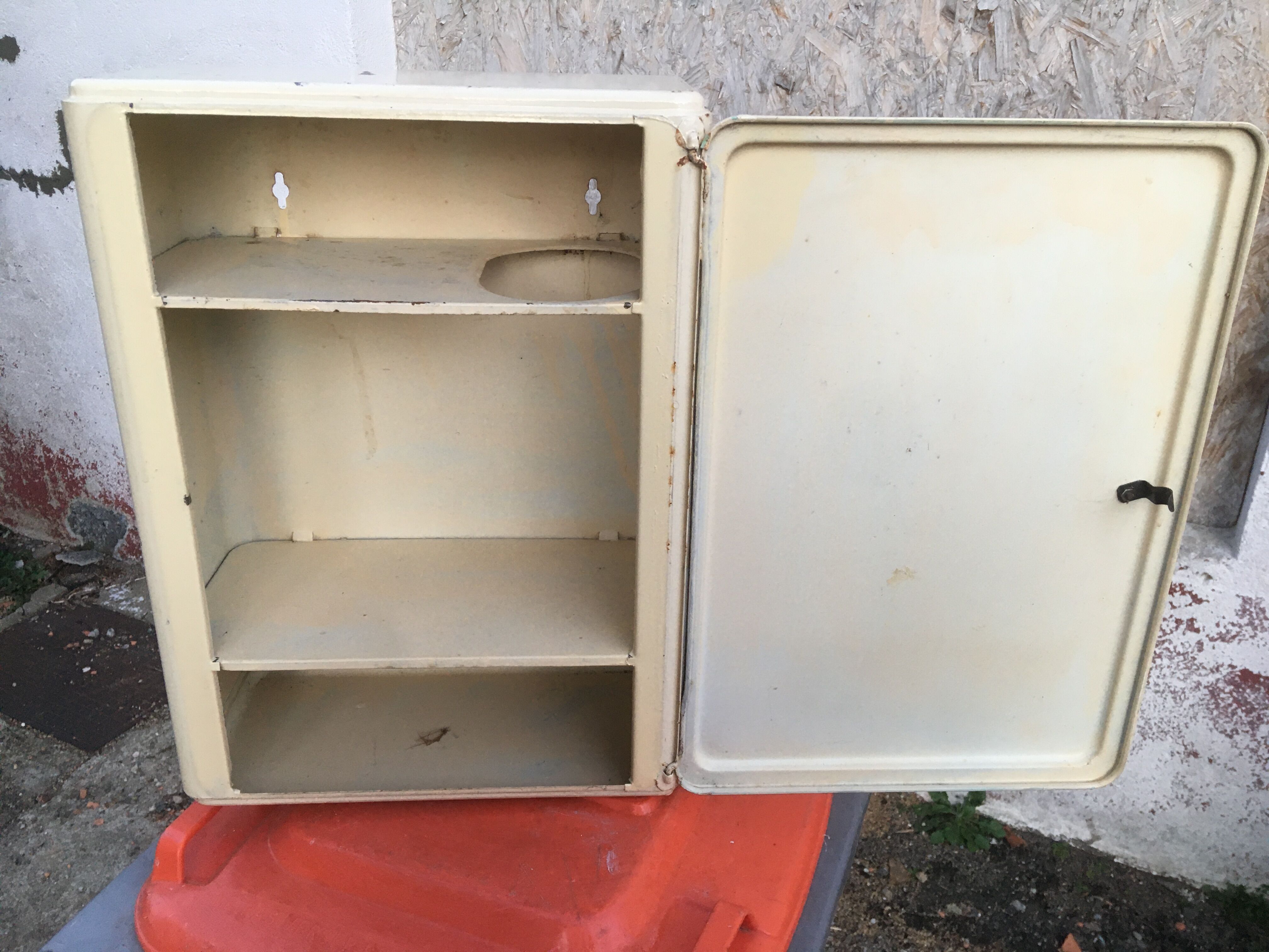 Vintage metal medicine cabinet wall closet in its juice