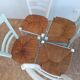 Suite de 4 chaises en bois et paille