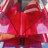 Kartell red magazine rack