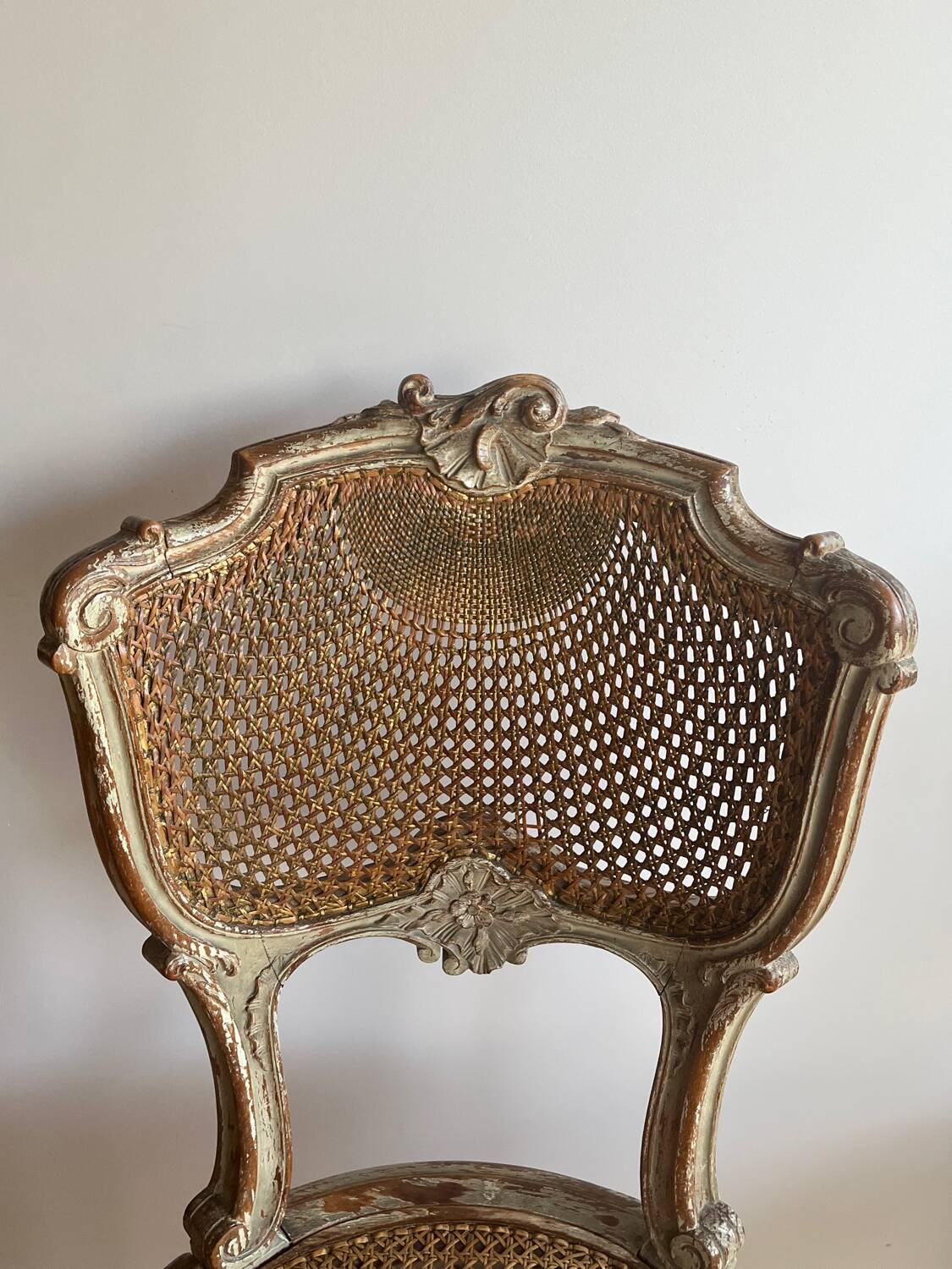 2 caned chairs in Louis XV Regency style