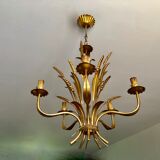 Golden suspension 5 fires with a bouquet of ears of wheat