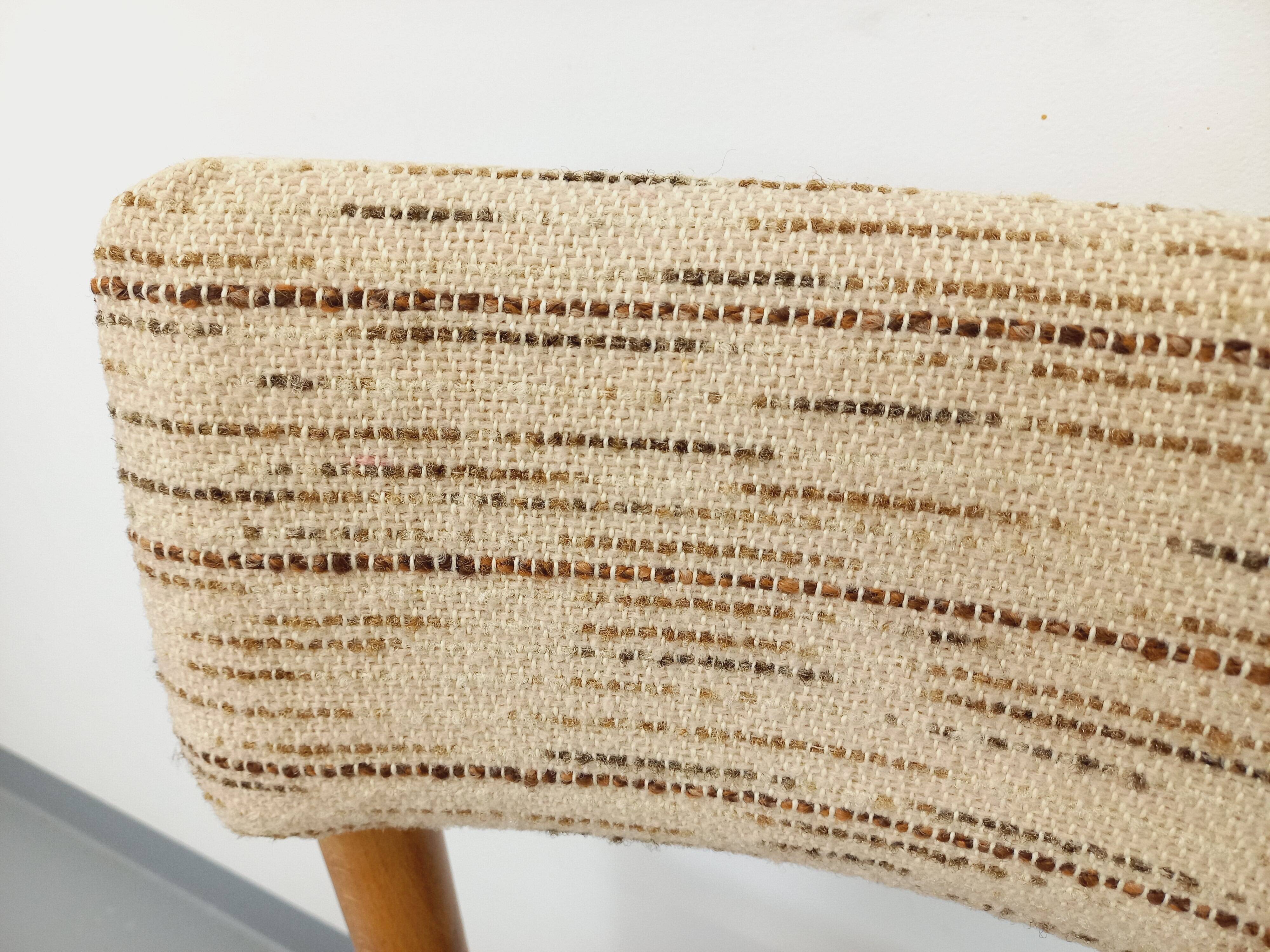 Pair of vintage Baumann chairs in wood and fabric from the 70s