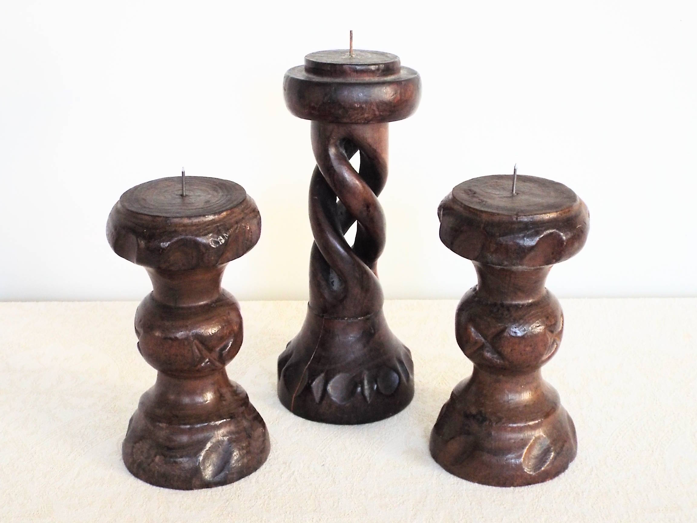 3 turned wooden candle holders