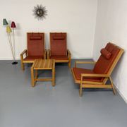 Scandinavian design lounge set in pine with 3 lounge chairs and a table from the 70s.