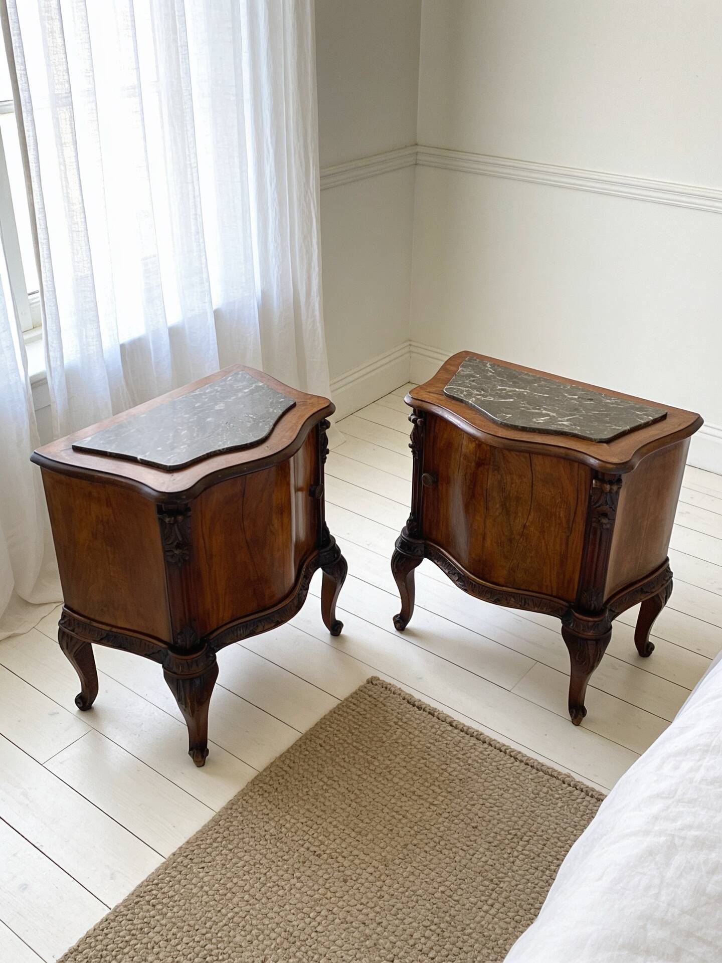 serpentine nightstands in walnut Art Deco