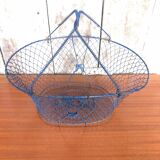Old foldable blue metal basket, vintage handles