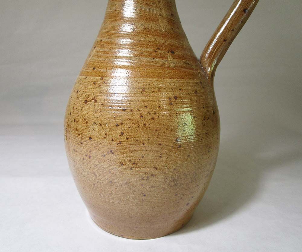 Elongated sandstone vase