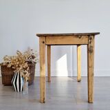Antique farmhouse table in raw wood