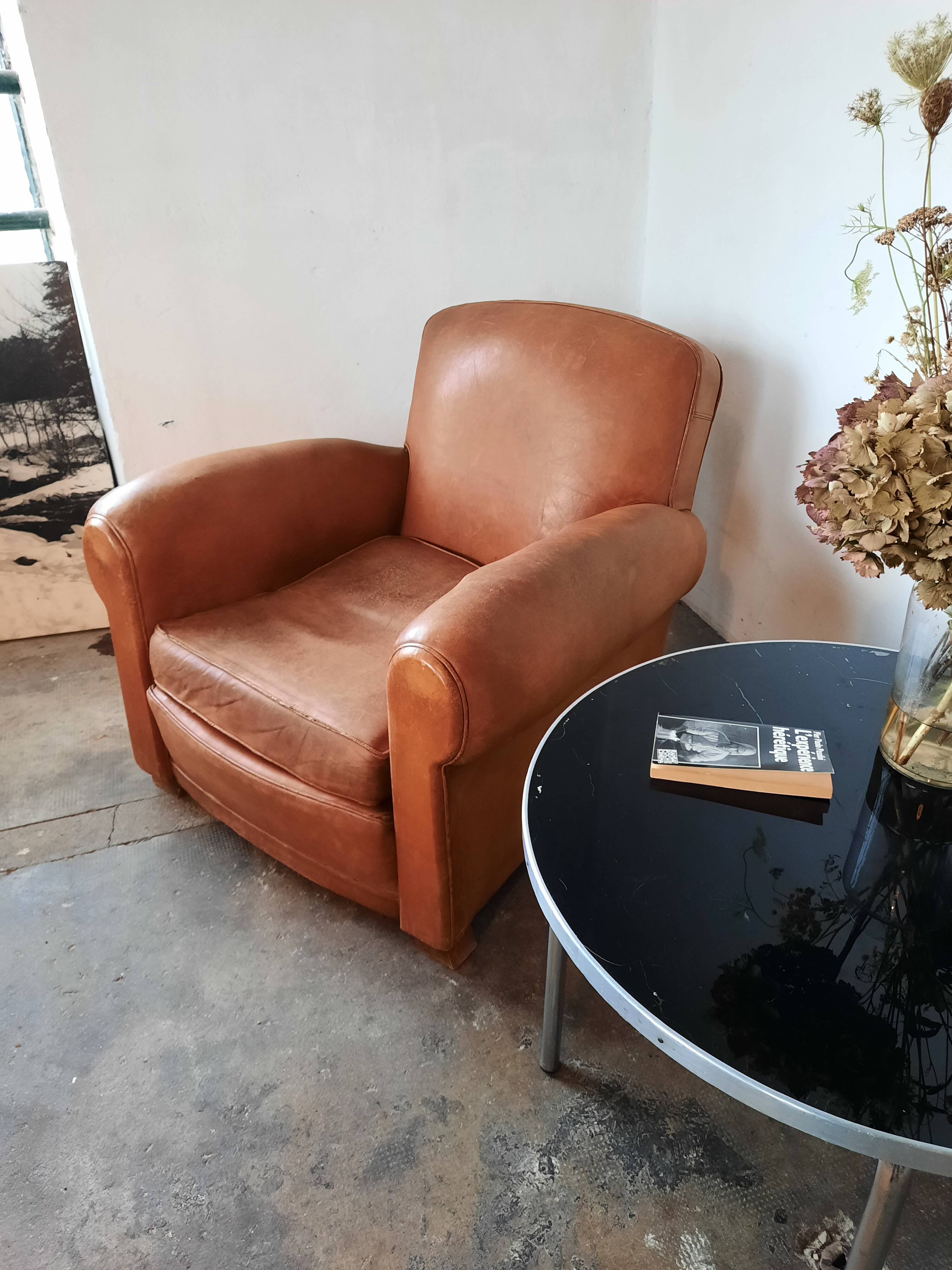 Old leather club chair 1940-1950