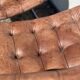 Paire de chaises en cuir par Robert Haussman