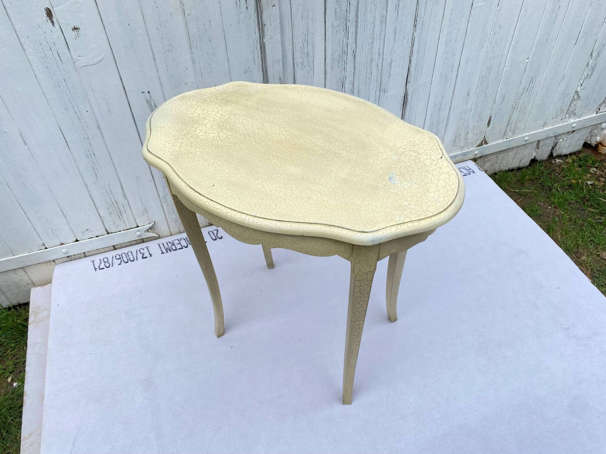 Eggshell-coloured drawer with a cracked effect side table.