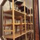Miroir vintage hexagonal avec cadre en ronce de bois