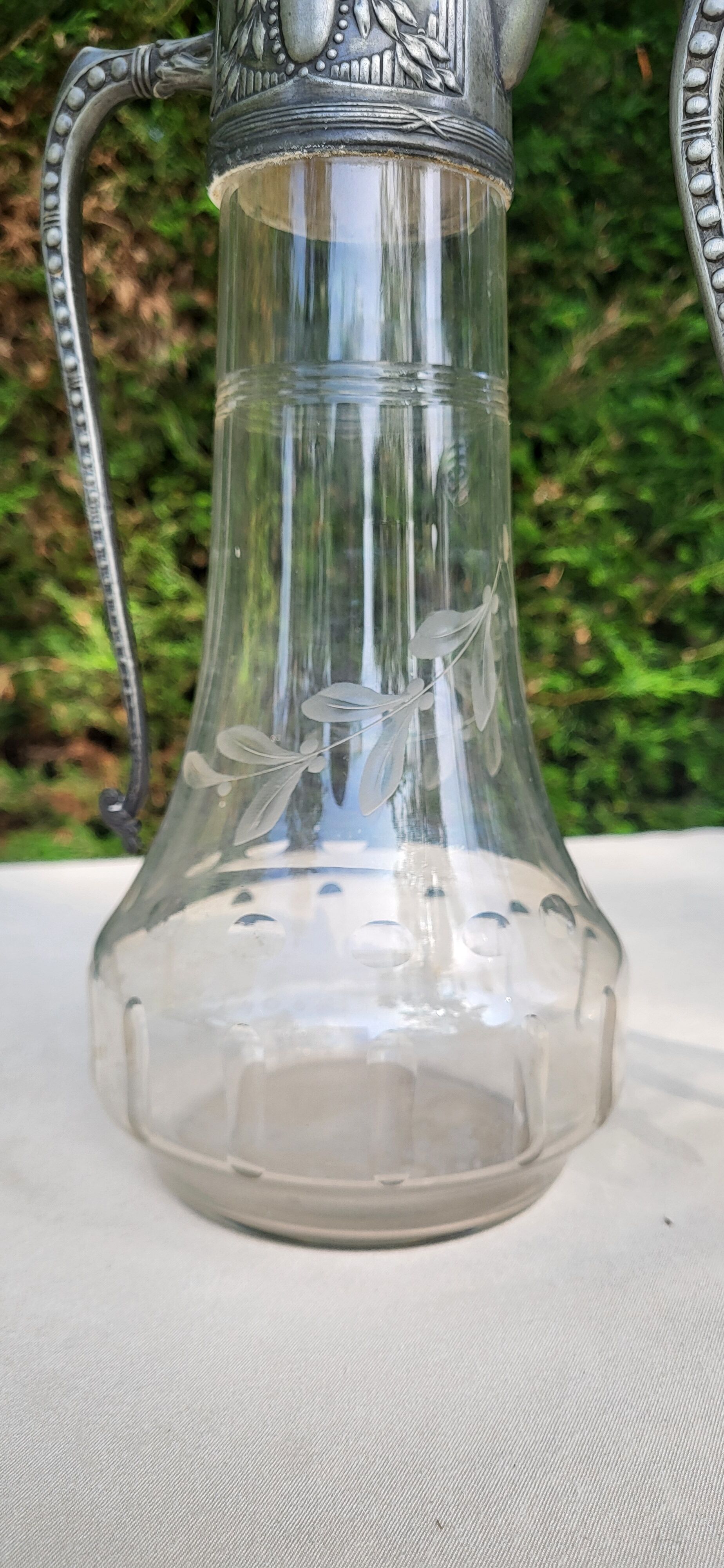 Pair of crystal and pewter jugs
