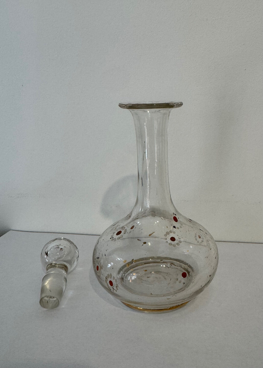 Antique blown glass carafe, enamelled with floral decoration, in the style of Legras.