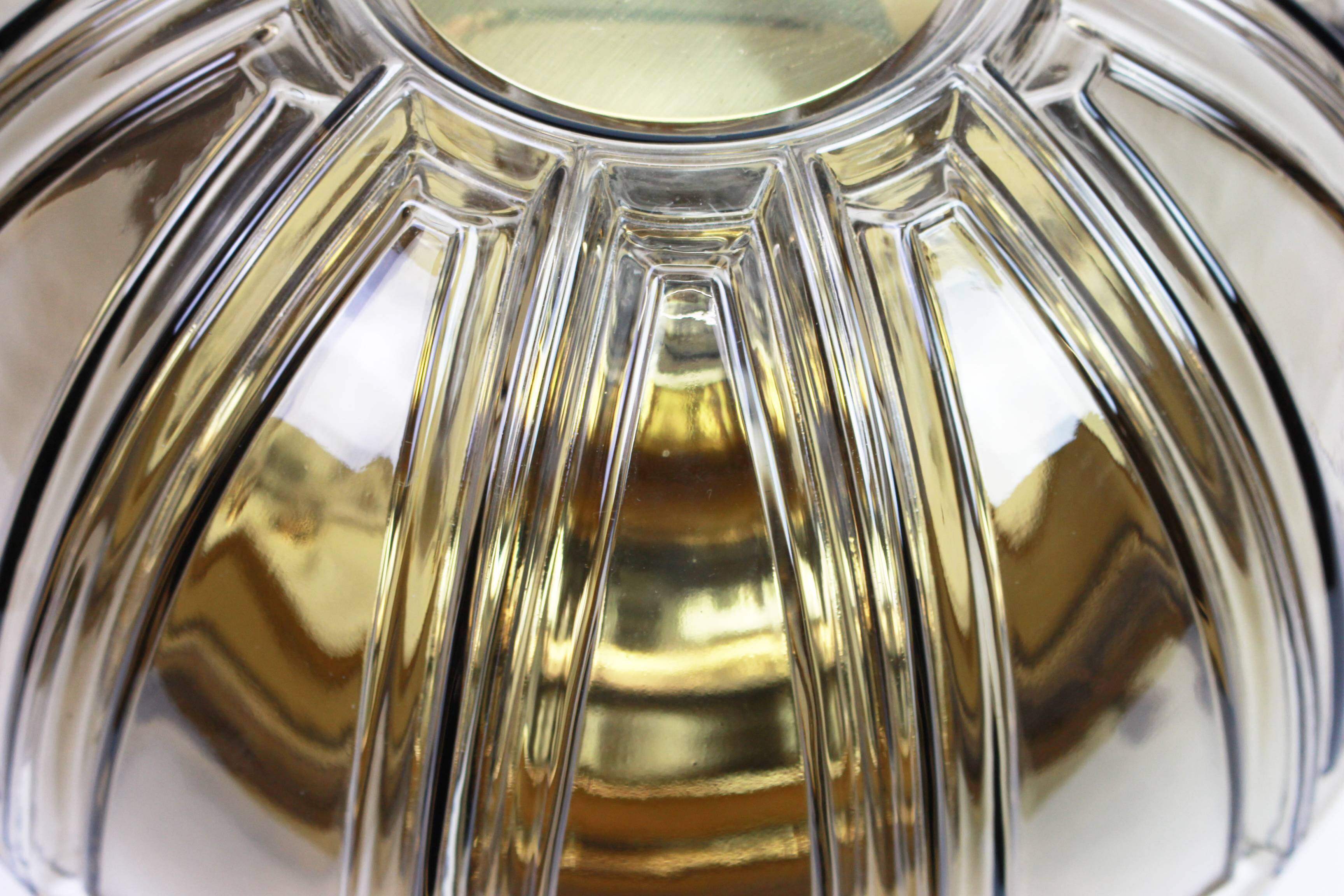 Pair of wall lights or ceiling lights in brass and amber glass by Limburg, Germany, 1960s.