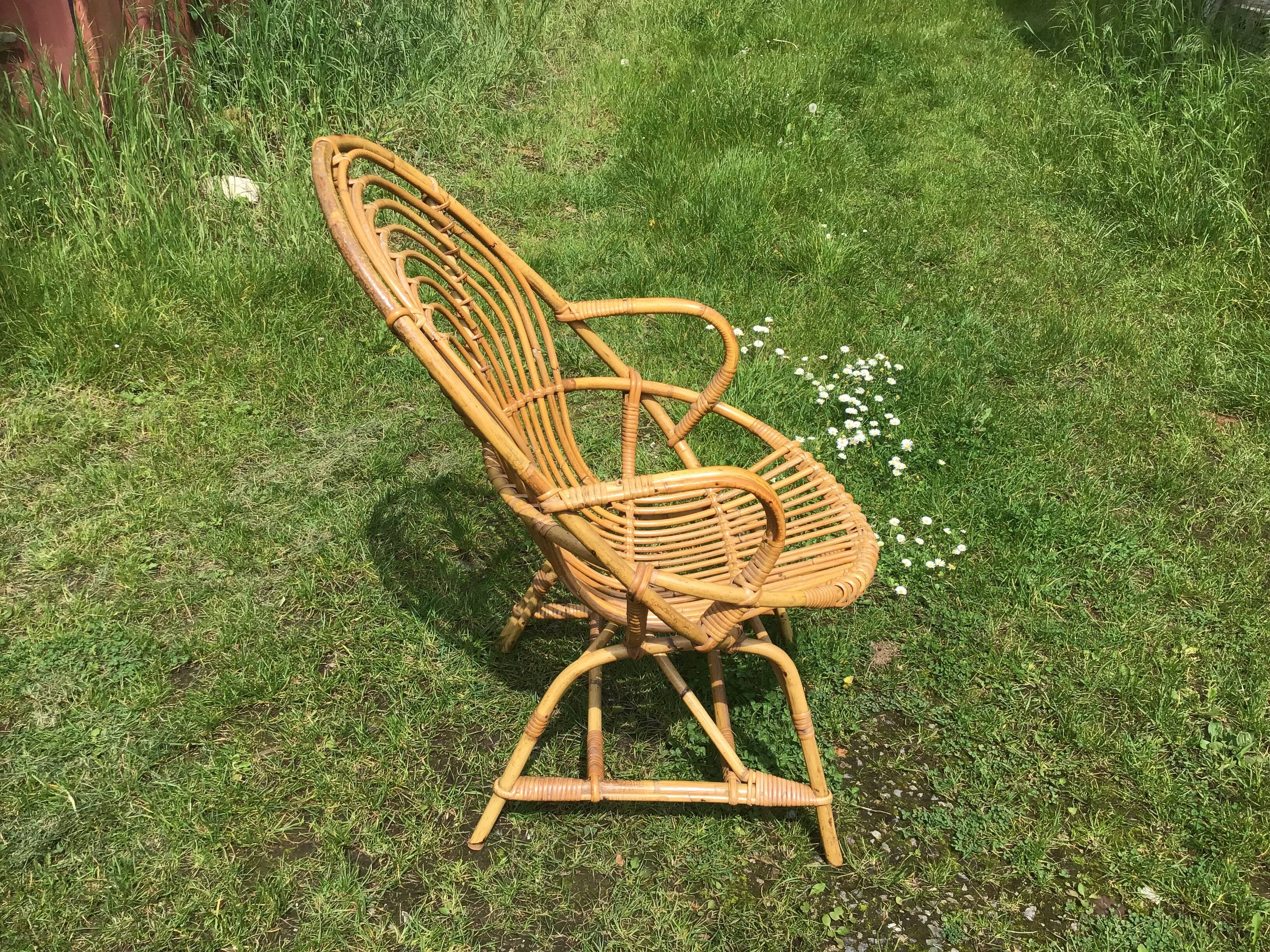 Vintage ovoid-shaped rattan armchair.