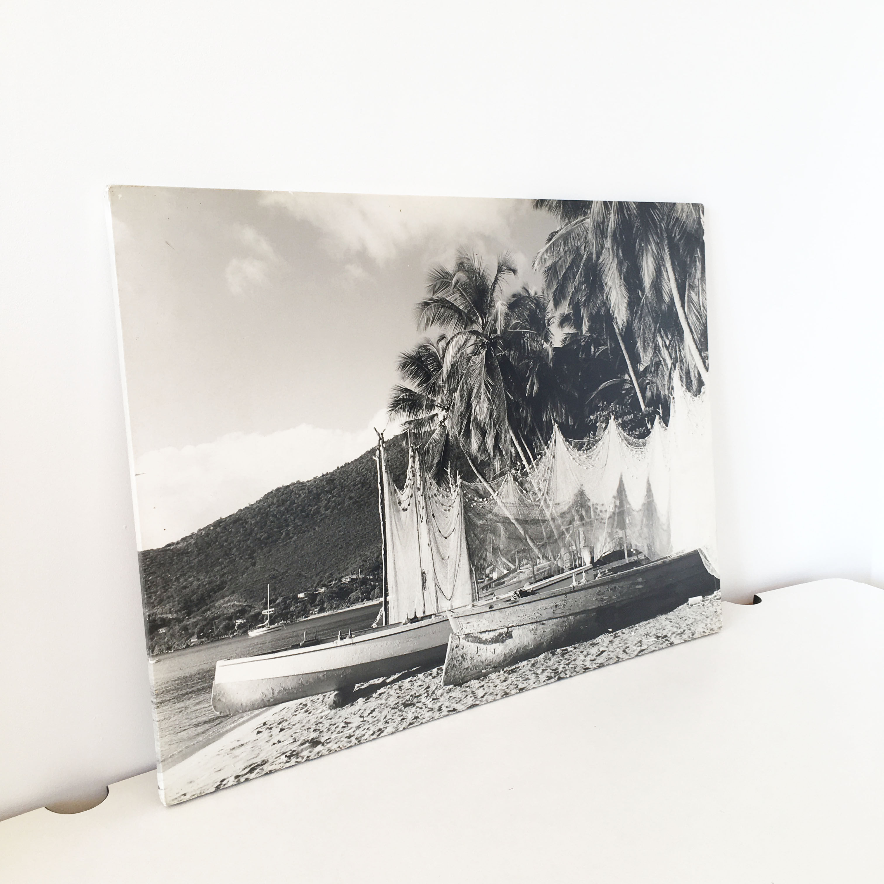 Old photograph on wood panel