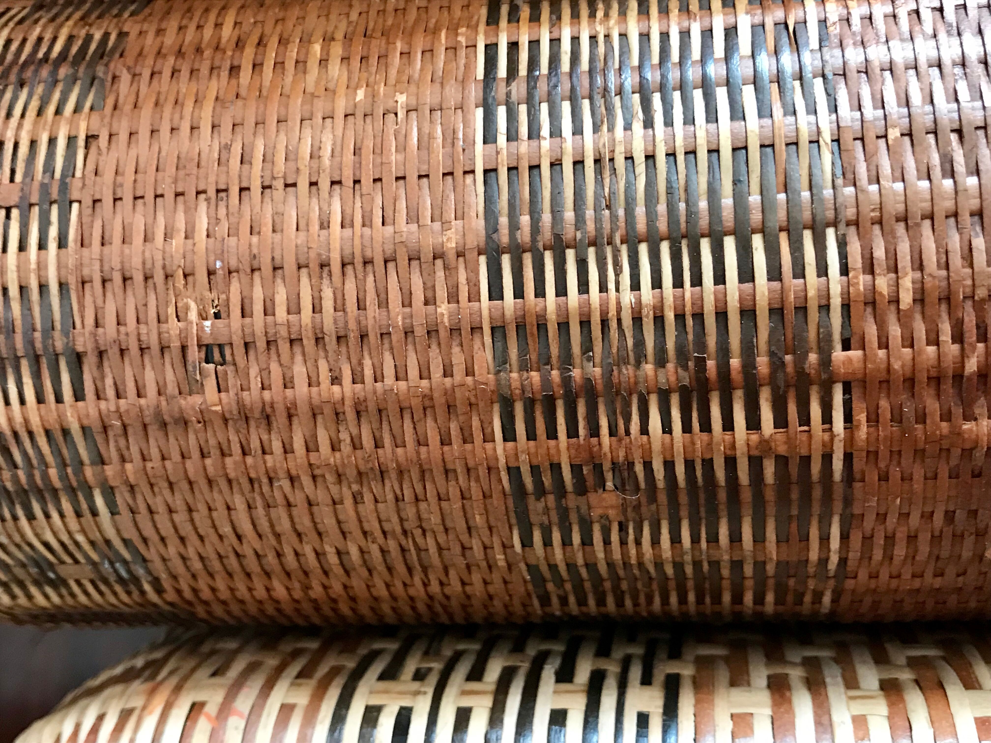 Set of three vintage rattan bottles