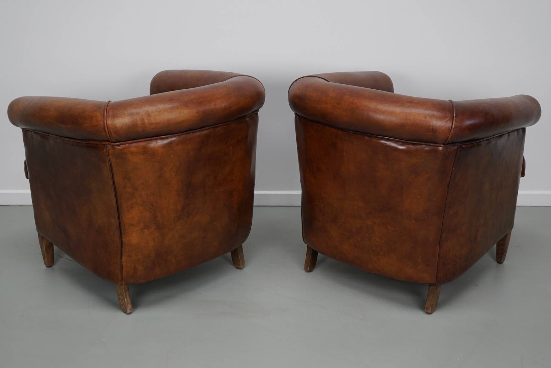 Vintage Dutch cognac coloured leather club chair, set of 2 with footstool