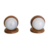 Pair of wood and opal sphere wall lamps