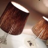 Pair of twisted glass foot bedside lamps and wool/vintage 60s and 70s lampshades