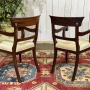 Set of 2 armchairs and 6 English mahogany chairs from the 1950s.