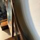 Antique carved wooden dressing table with marble and tilting oval mirror.
