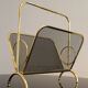Magazine rack in brass and black lacquered metal, Italy 1970s