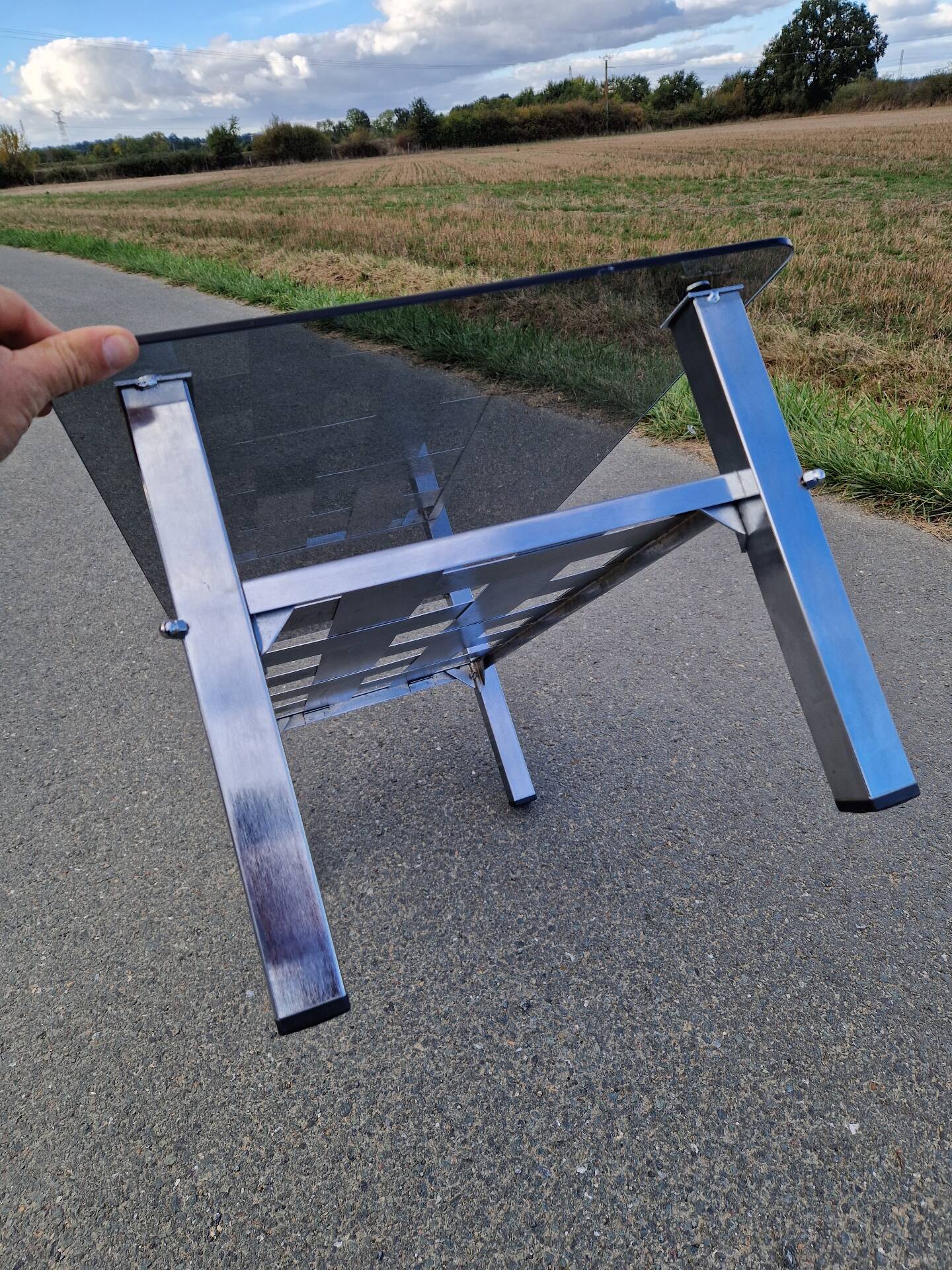 Stainless steel and smoked glass coffee table