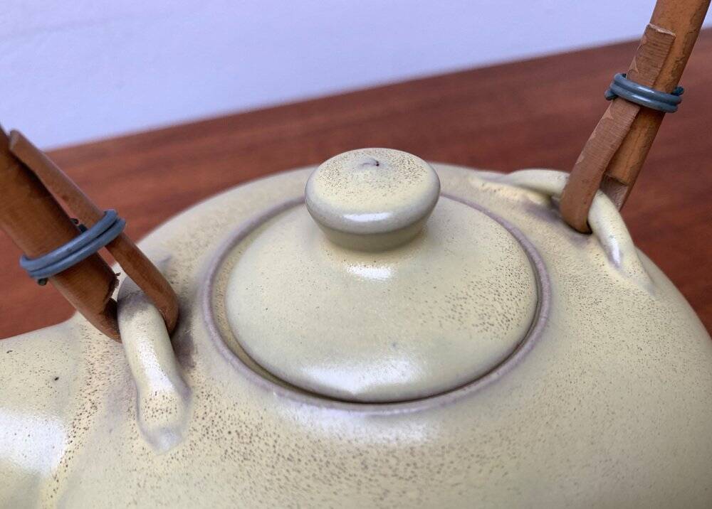 Mid-century ceramic teapot with bamboo handle, 1960s.
