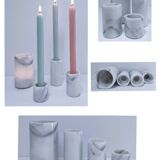 Four white marble candlesticks with black veins, 70s design