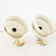 Paire d'appliques globe opaline jaune et doré