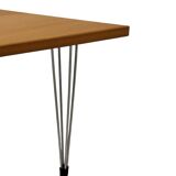 Vintage Danish triangular side table with hairpin legs design