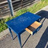 Blue-painted wooden table with drawer