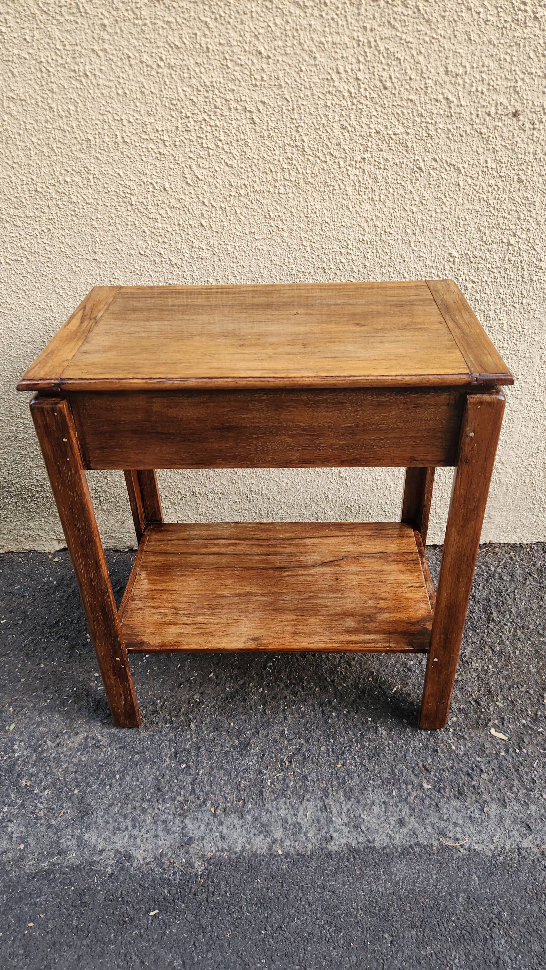 Beautiful vintage wooden bedside table with mirror.