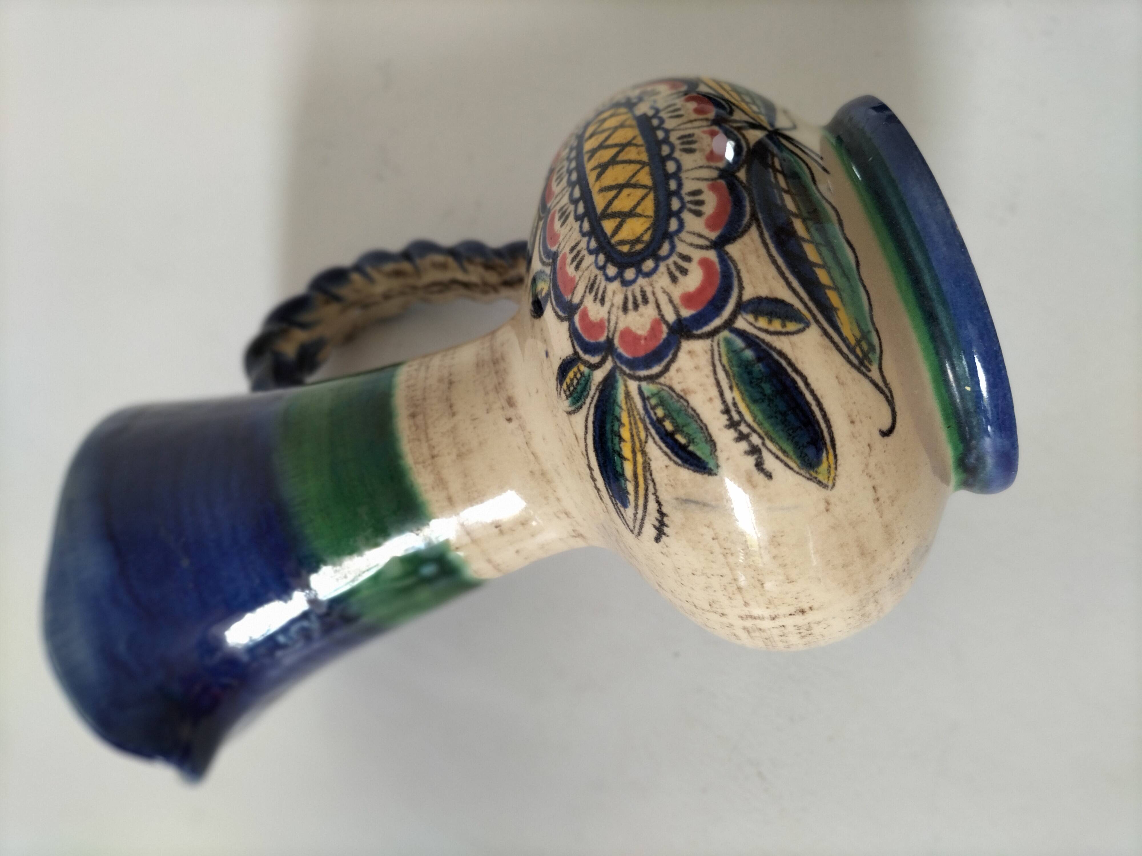 Earthenware pitcher with rustic floral decoration – 1950s-1970s