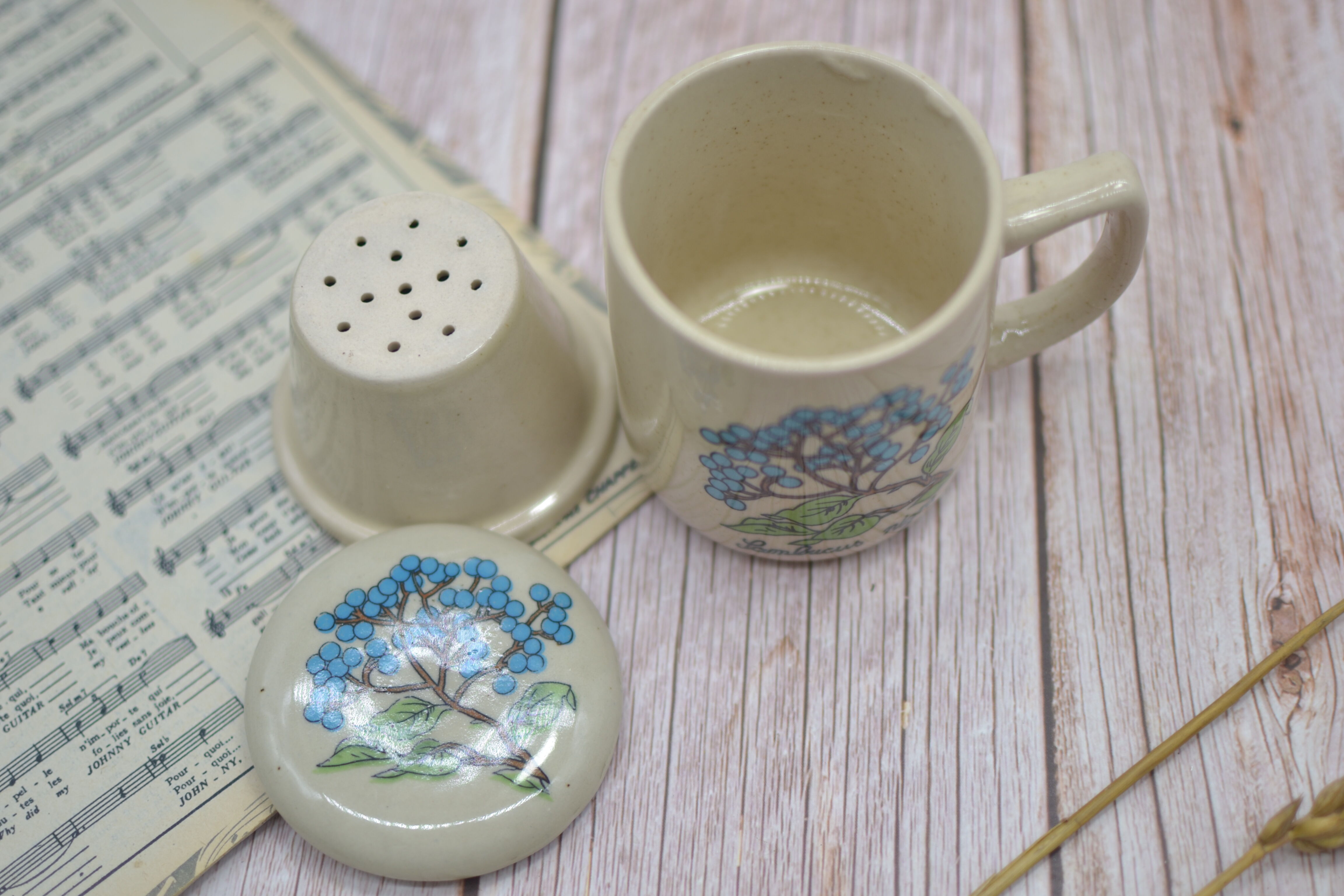 Vintage sandstone teapot with infuser