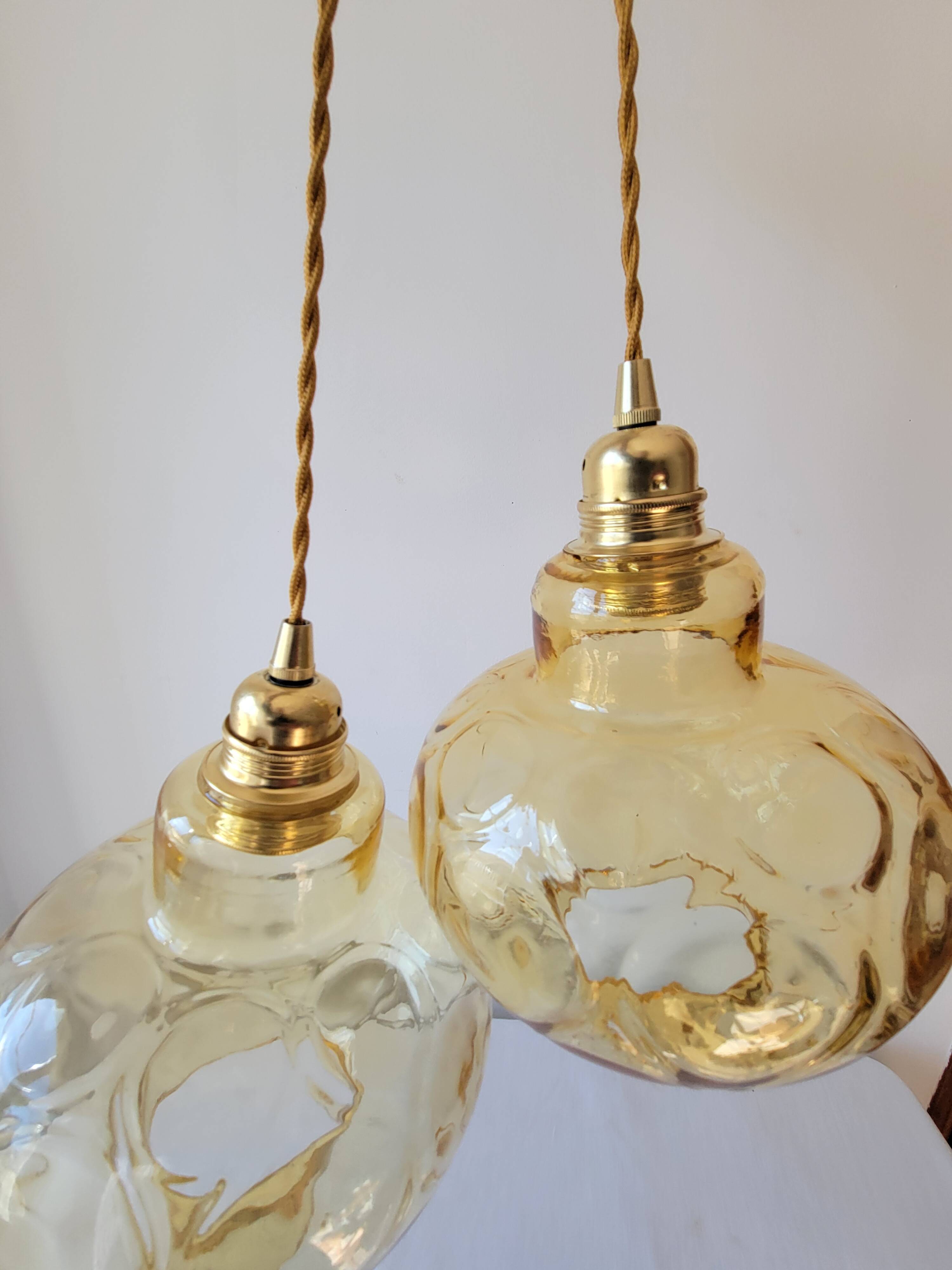 Duo of amber glass pendant lights