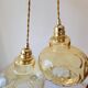 Duo of amber glass pendant lights