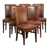 Ensemble de 6 chaises de salle à manger en peau de mouton de couleur cognac avec une belle patine.