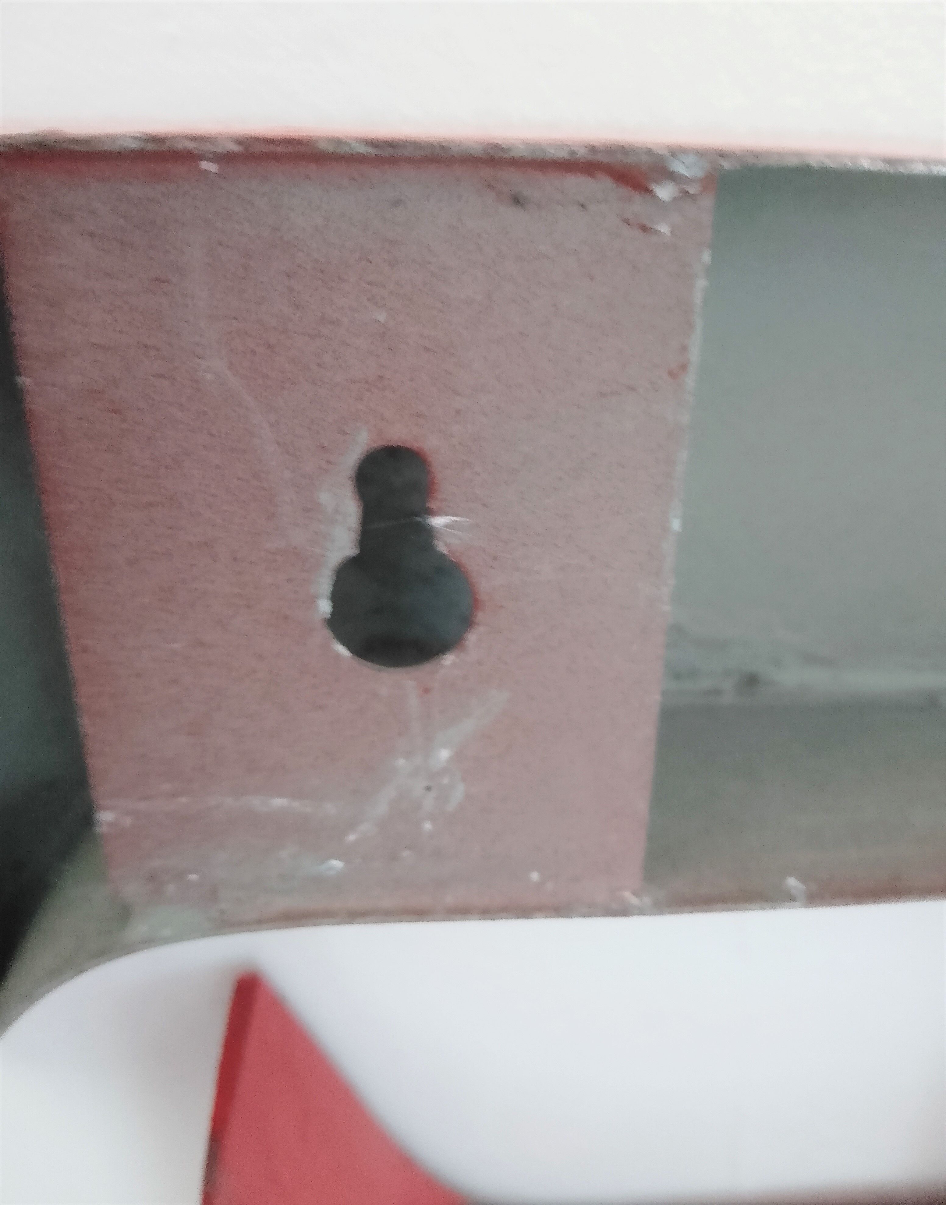 Red metal sign letter "E"